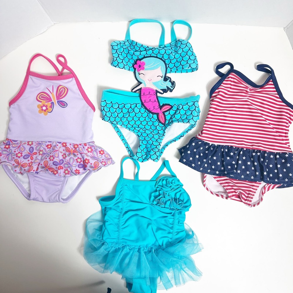 Bundle of 4 girls once piece swimsuits size 3-6 months